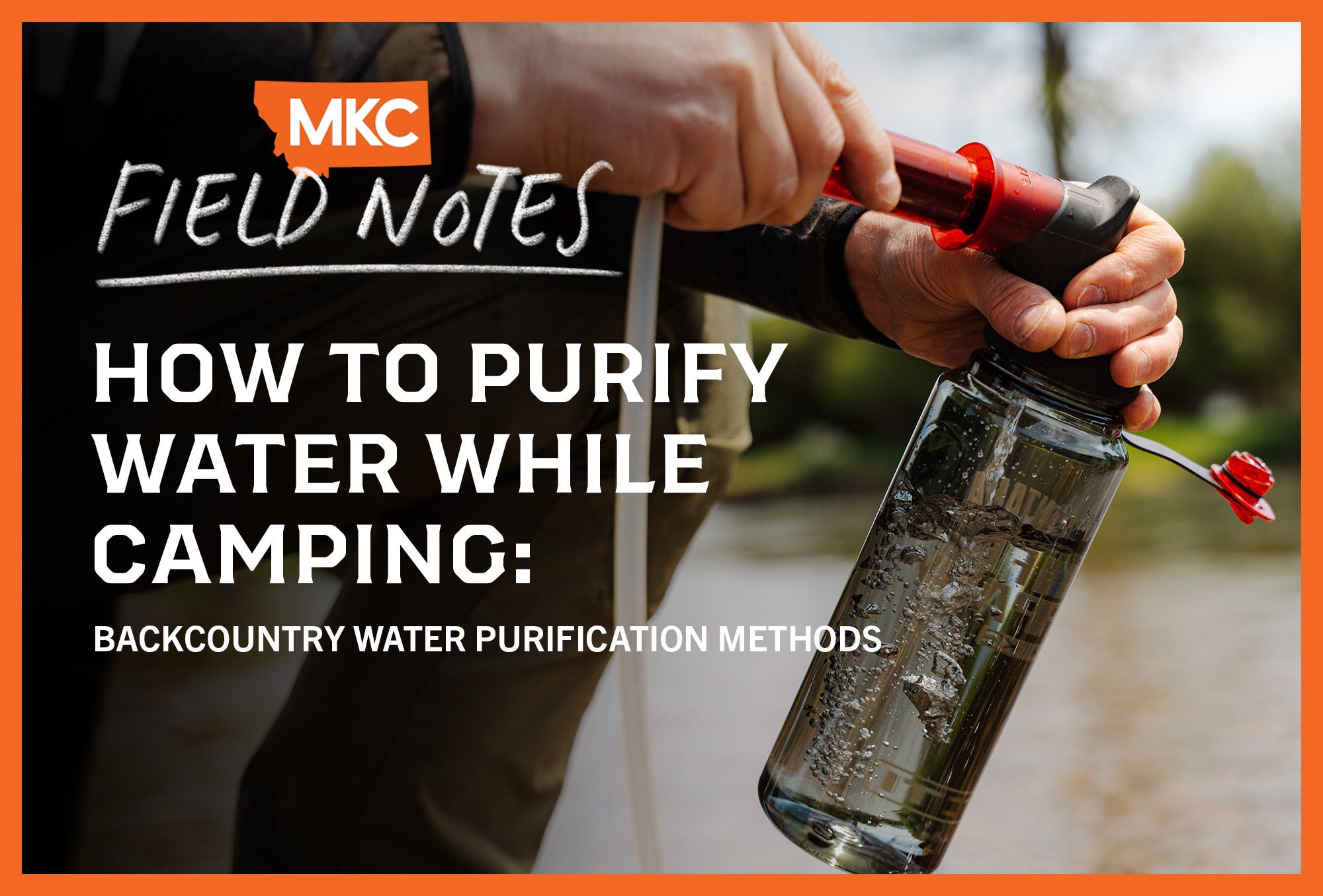 Hands holding a water bottle equipped with a backcountry water purification filter.
