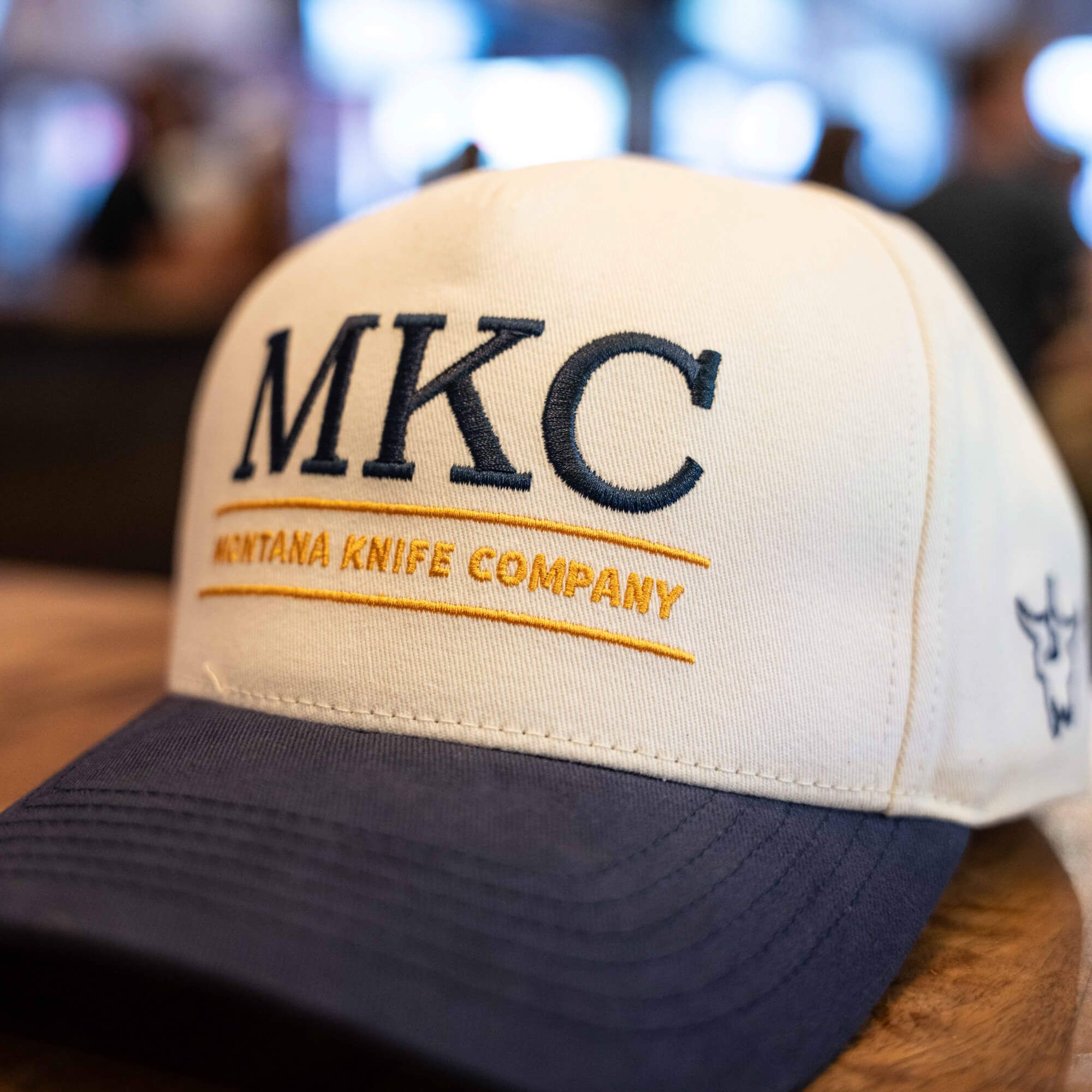 MKC UNIVERSITY HAT - IVORY/NAVY