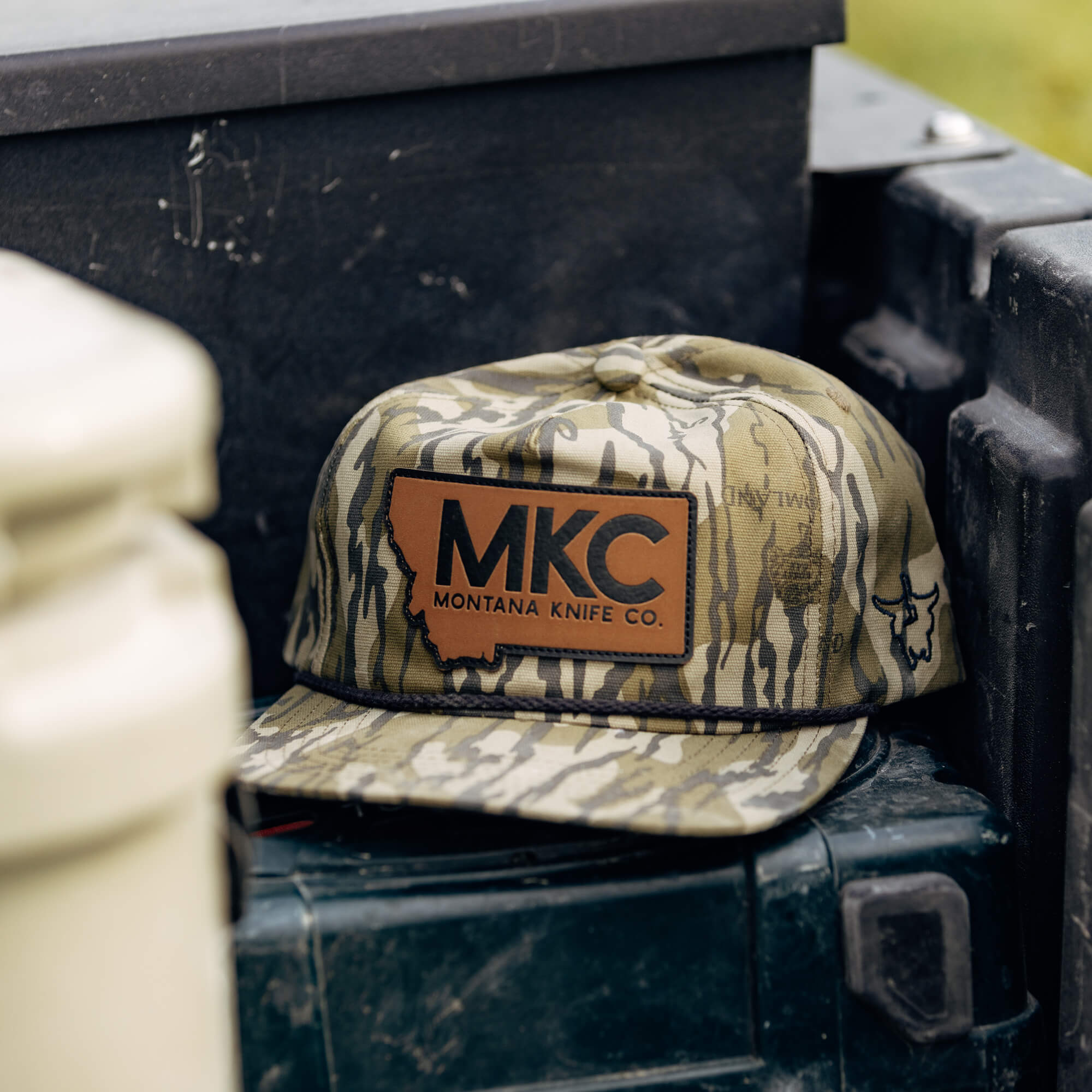 MKC X MOSSY OAK ROPE HAT - BOTTOMLAND