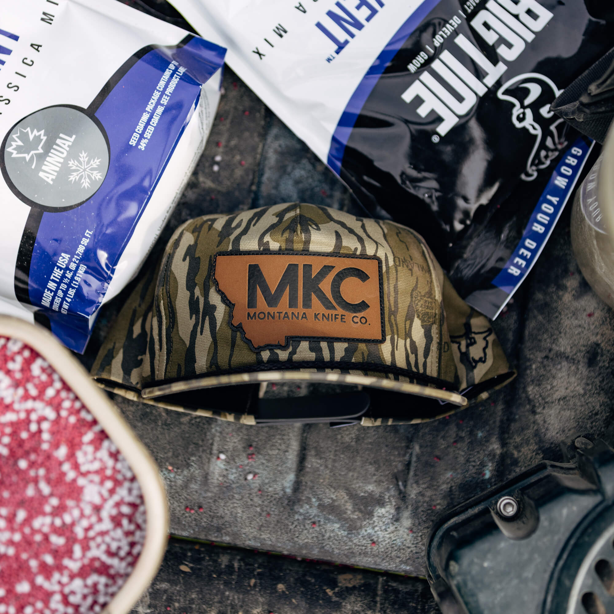MKC X MOSSY OAK ROPE HAT - BOTTOMLAND
