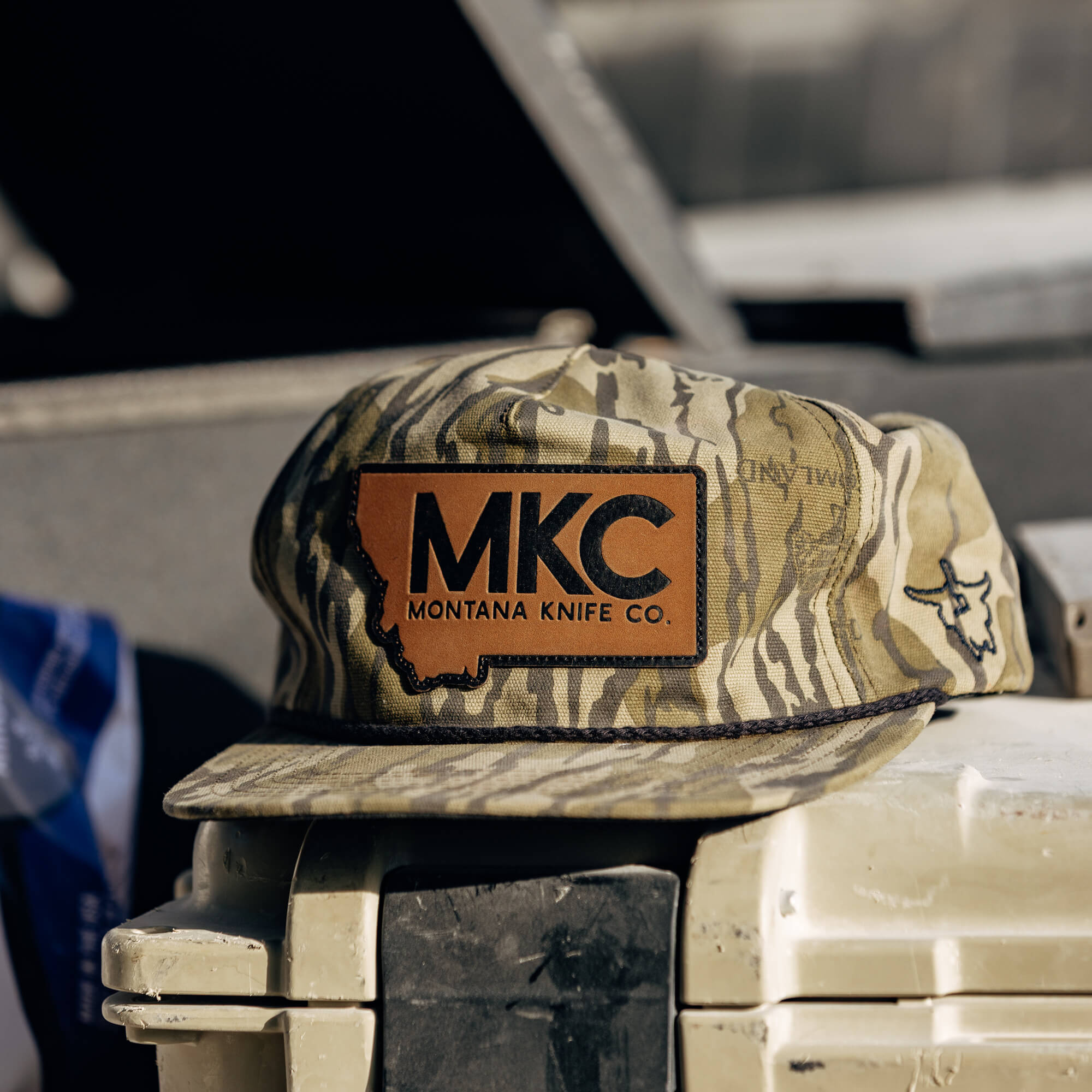 MKC X MOSSY OAK ROPE HAT - BOTTOMLAND