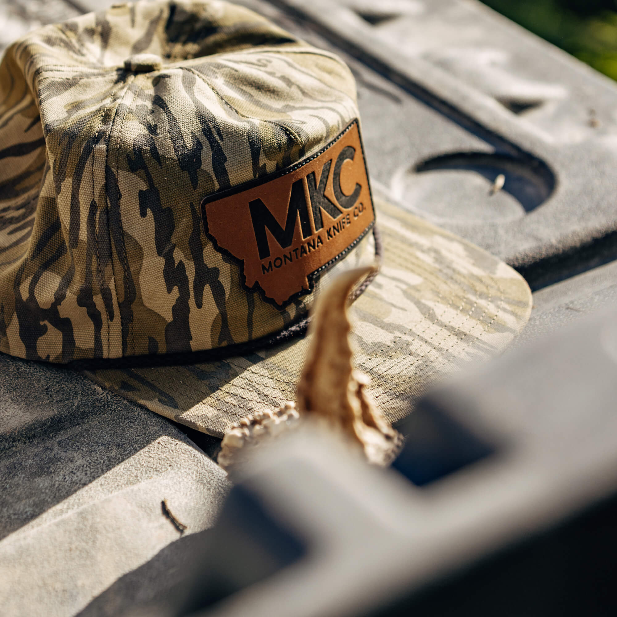 MKC X MOSSY OAK ROPE HAT - BOTTOMLAND