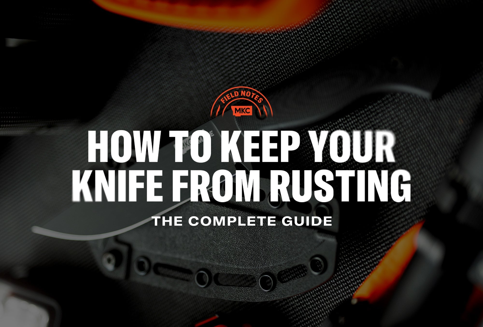 A knife and sheath rest on a dark surface with orange lighting, illustrating a guide on how to keep knives from rusting.