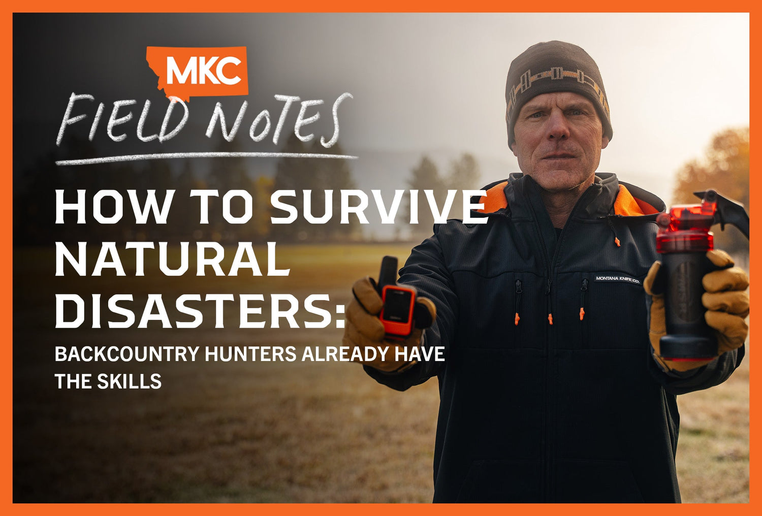 Man holding survival gear in an outdoor setting.