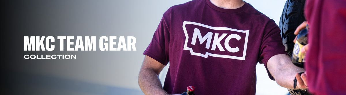 MKC Team Collection shirt featuring a bold MKC logo, ideal for outdoor enthusiasts and working professionals.